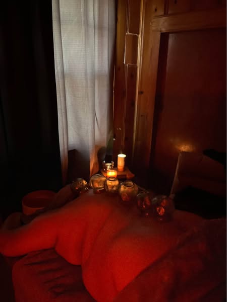 Aura Wellness - Relaxing massage room with candles
